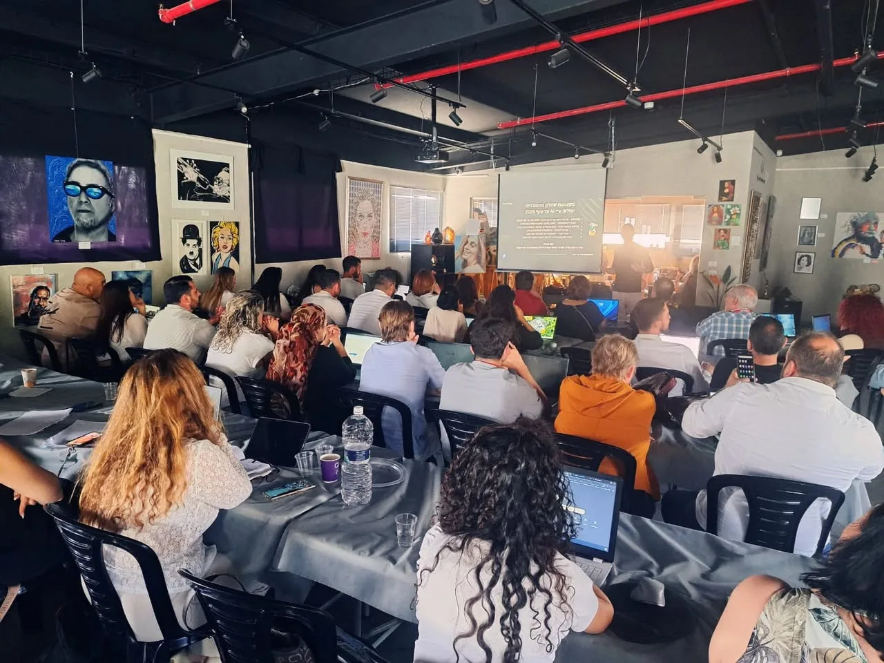 Participants working during an AI workshop