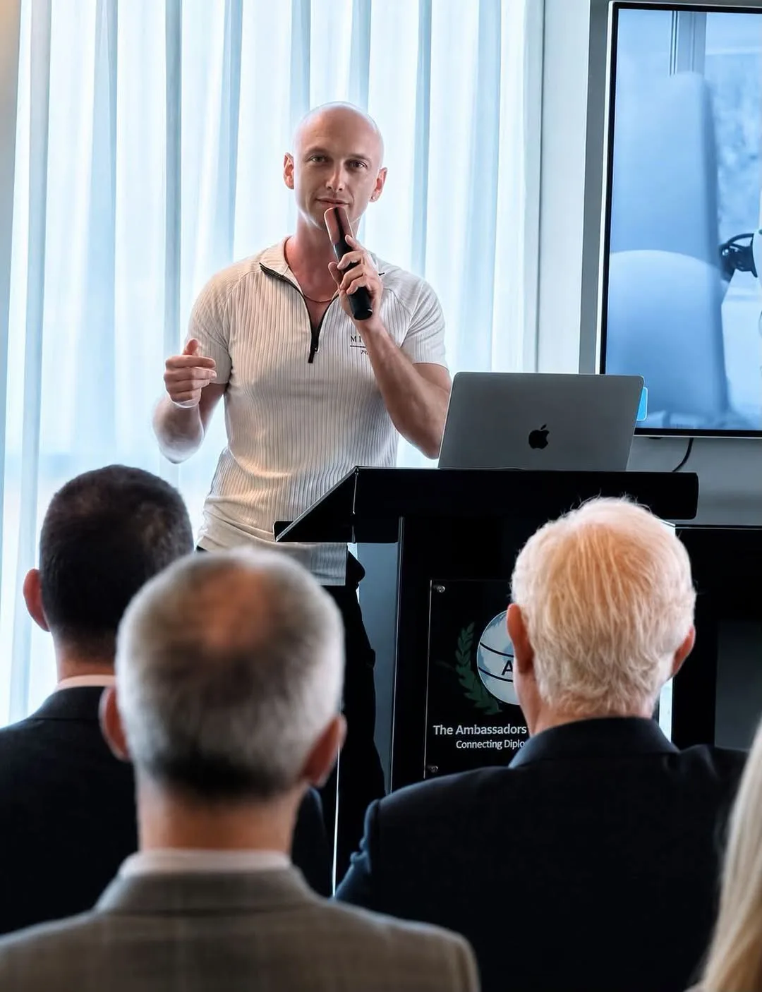 Alex Kap speaking to an international audience